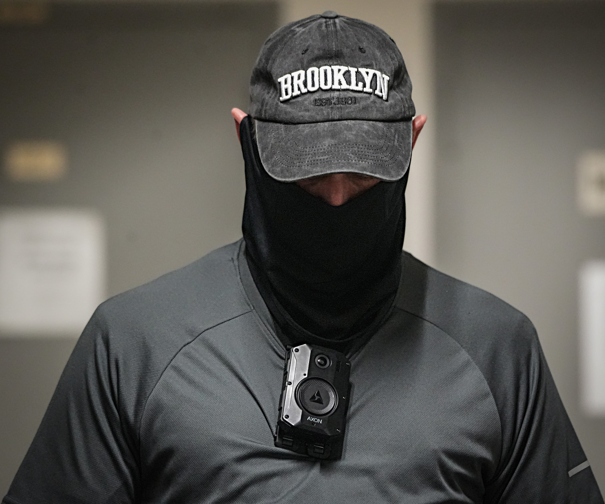 person wearing a hat and mask