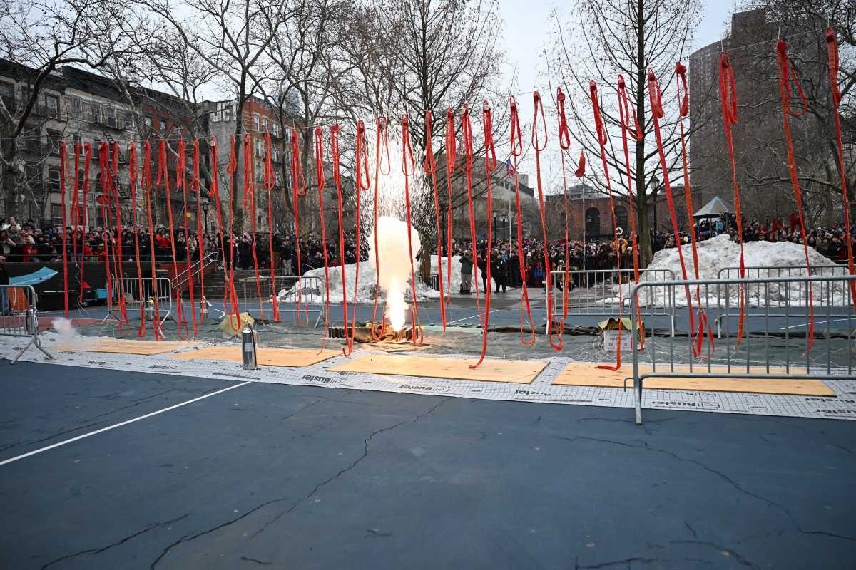 PHOTOS: Chinatown lights up the Lunar New Year with annual firecracker ceremony 6