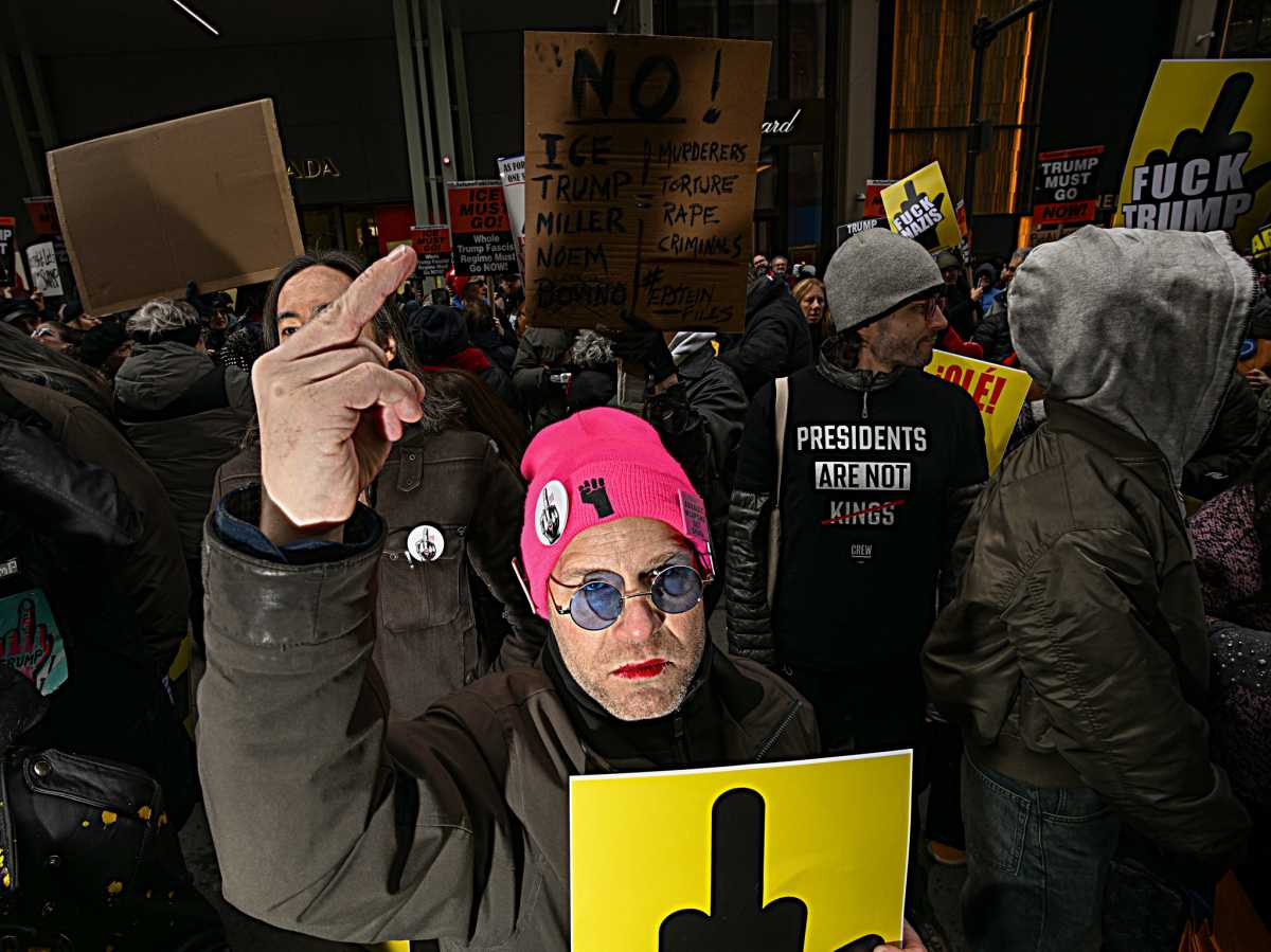 Fingers of fate: Hundreds flip the bird at Trump Tower in crass Presidents' Day protest against Donald Trump 7
