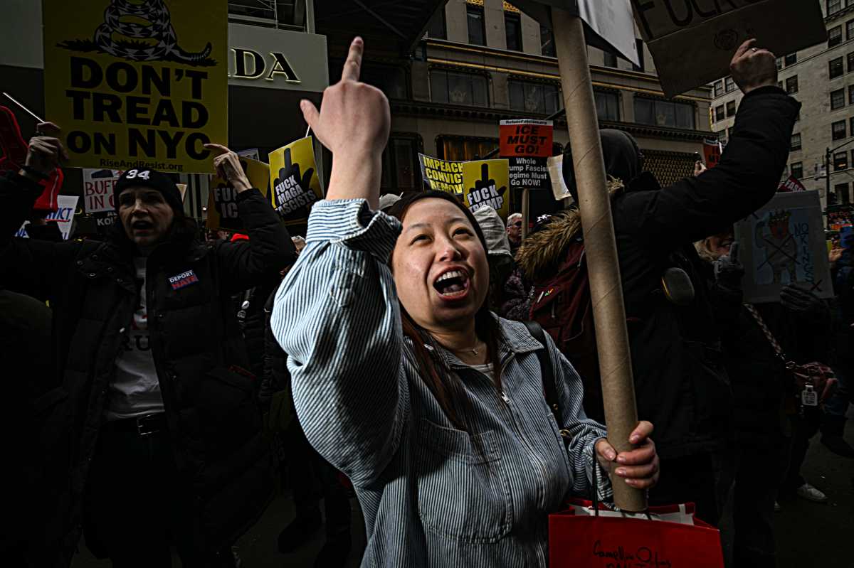 Fingers of fate: Hundreds flip the bird at Trump Tower in crass Presidents' Day protest against Donald Trump 2