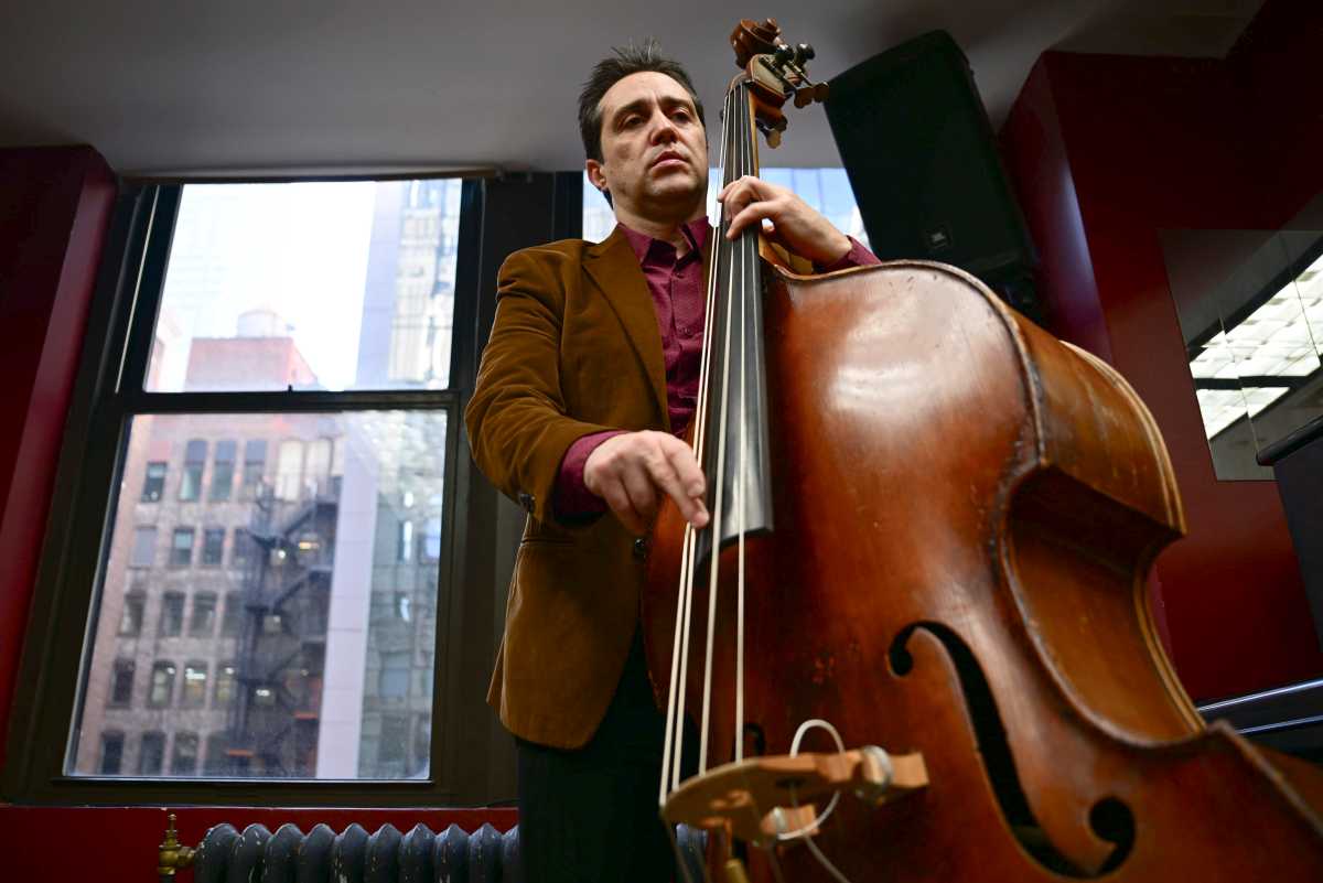 Queens bassist Trifon Dimitrov releases new album honoring the renowned players who came before him 2 Bassist Trifon Dimitrov poses for a portrait on Thursday, February 12, 2026.