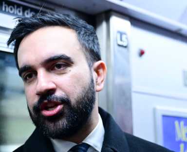 Mayor Zohran Mamdani riding the subway.