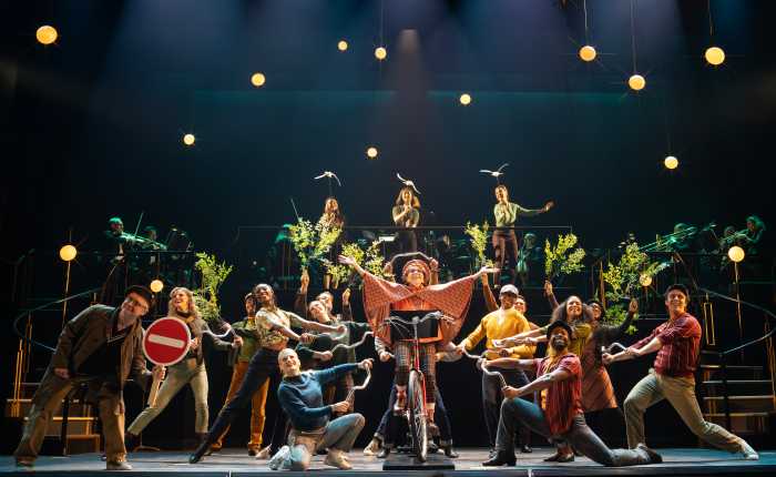 group of people on stage from a scene in "High Spirits"