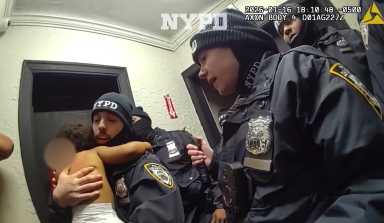 NYPD officers with a baby