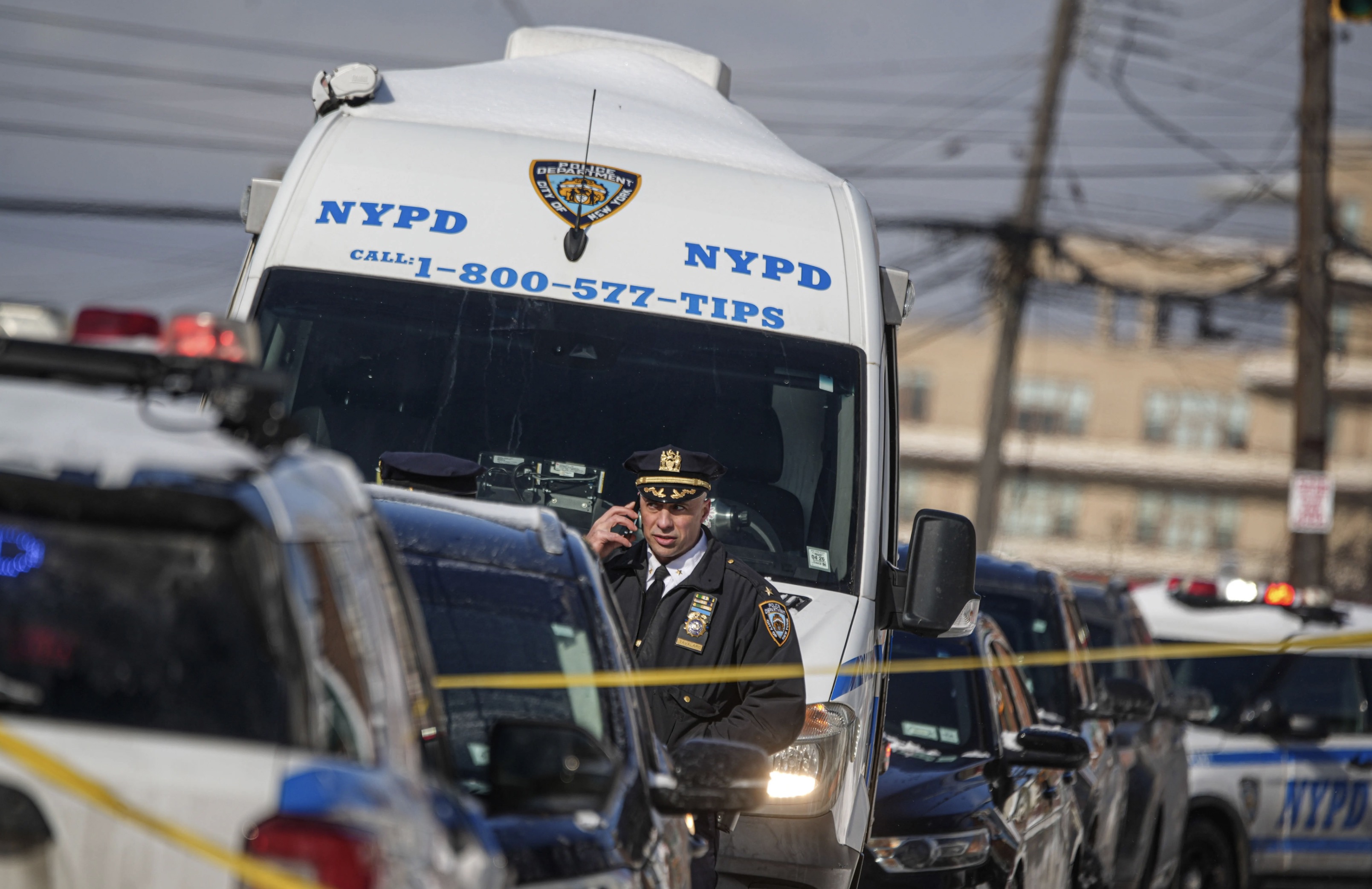 NYPD officer at scene of NYC crime murder