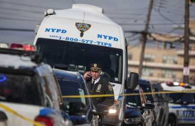 NYPD officer at scene of NYC crime murder