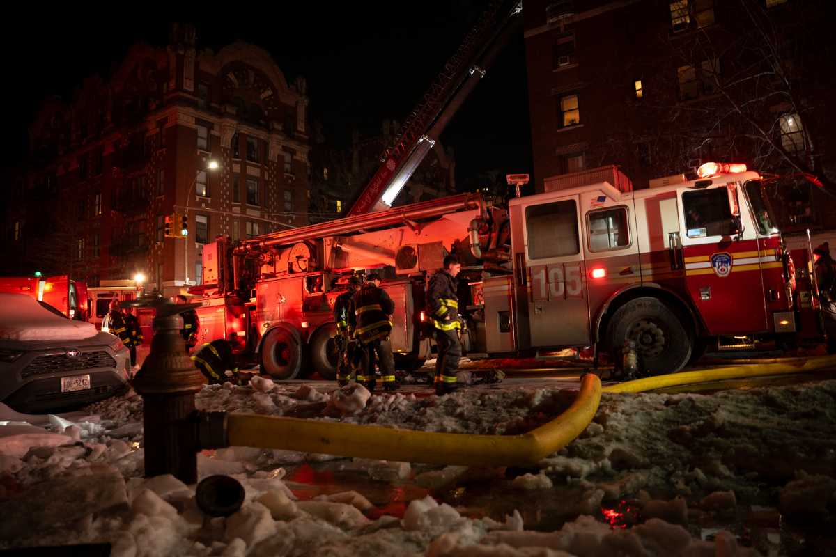 firefighters in Brooklyn putting out a fire
