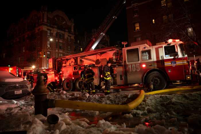 firefighters in Brooklyn putting out a fire