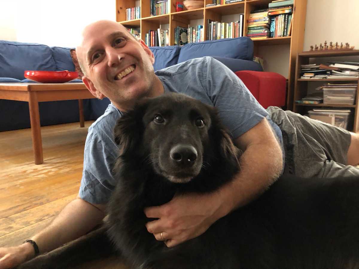 Council Member Harvey Epstein and his dog, Homer.