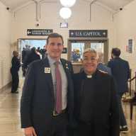 Congressman Dan Goldman brings immigrant rights advocate Father Fabian Arias to capital for State of the Union Address 1 Congress member Dan Goldman with Father Arias at State of the Union for Trump