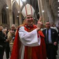Incoming Archbishop Ronald Hicks speaks at lass mass before taking the reigns of New York's Catholic faithful 6 Incoming Archbishop of New York Ronald Hicks smiling while giving a blessing