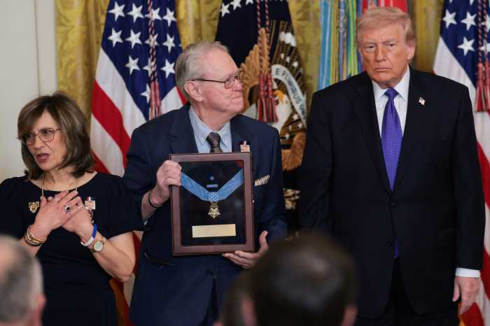 U.S. President Donald Trump presents the posthumous Medal of Honor to Linda and Robert Ollis, parents of U.S. Army Staff Sergeant Michael Ollis, during a ceremony at the White House in Washington, D.C., U.S., March 2, 2026.