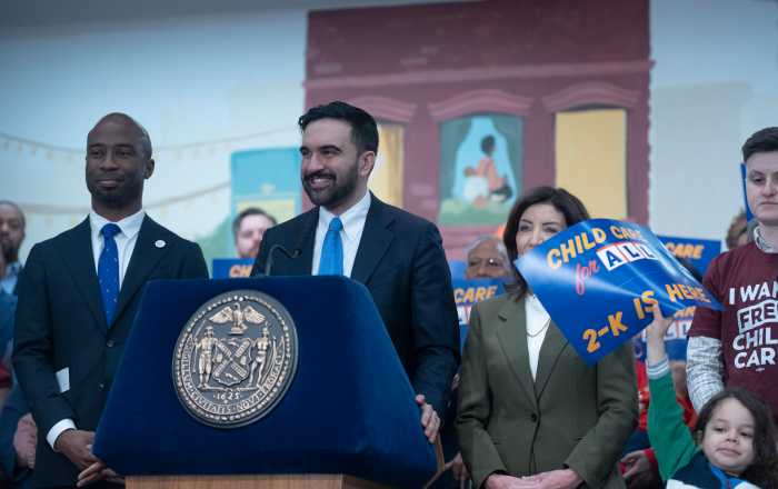 MAMDANI’S FIRST 100 DAYS: Free childcare for two thousand two-year-olds coming to priority neighborhoods this fall 2 Mamdani smiling at podium at childcare announcement
