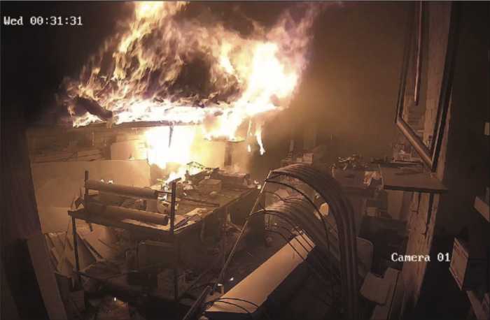 father-and-son arson fire at Queens print shop